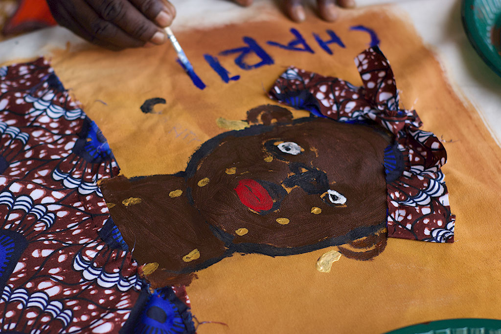 A painting of a black woman crying golden tears