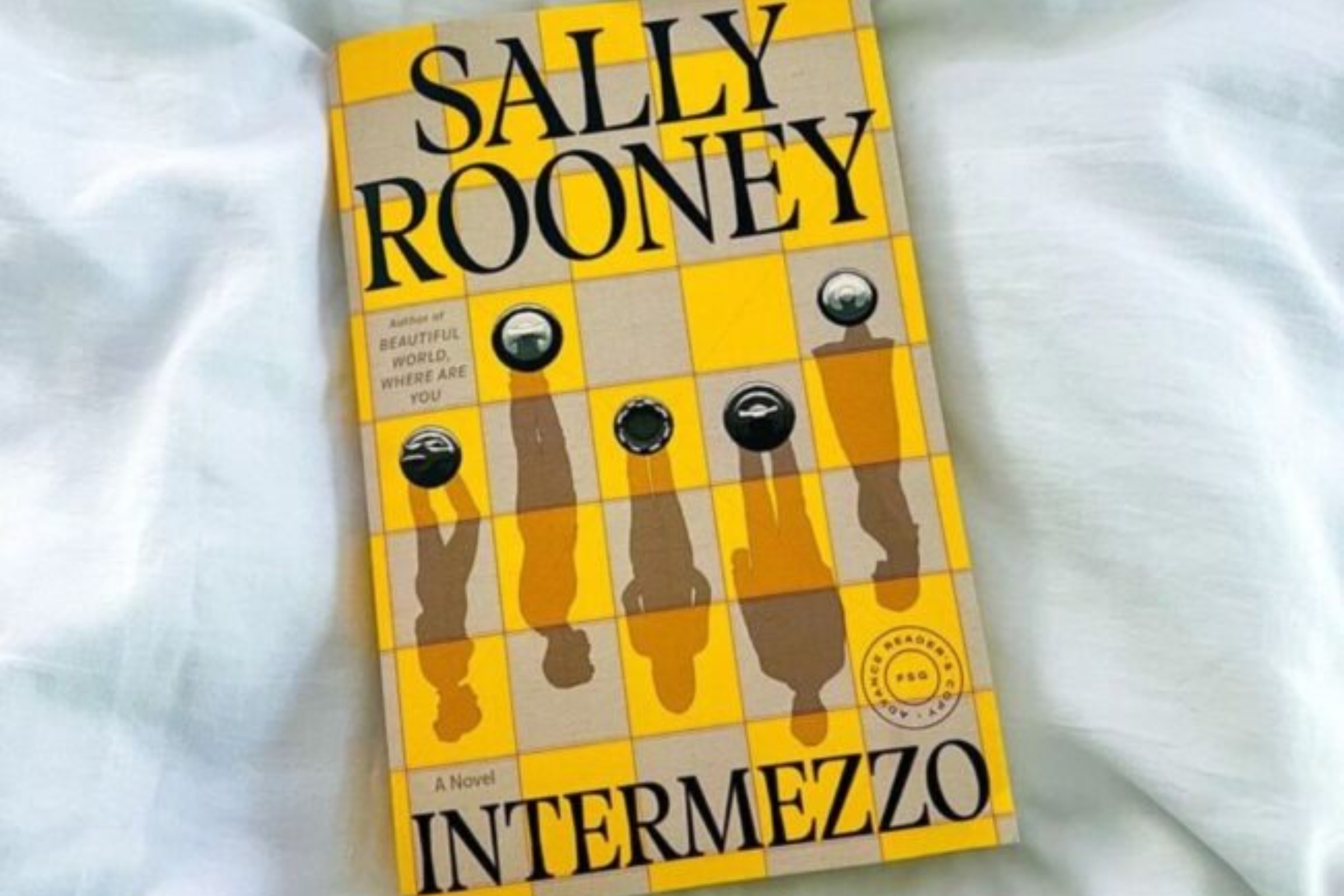 A yellow book cover reading: Sally Rooney, Intermezzo.