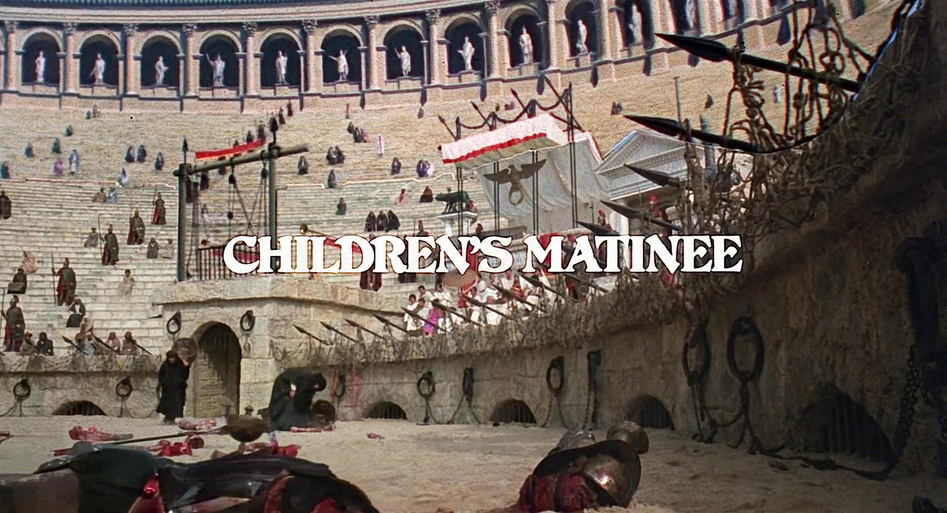 A movie still shows a Roman amphitheatre, covered in body parts, over which a sign reads 'children's matinee'.