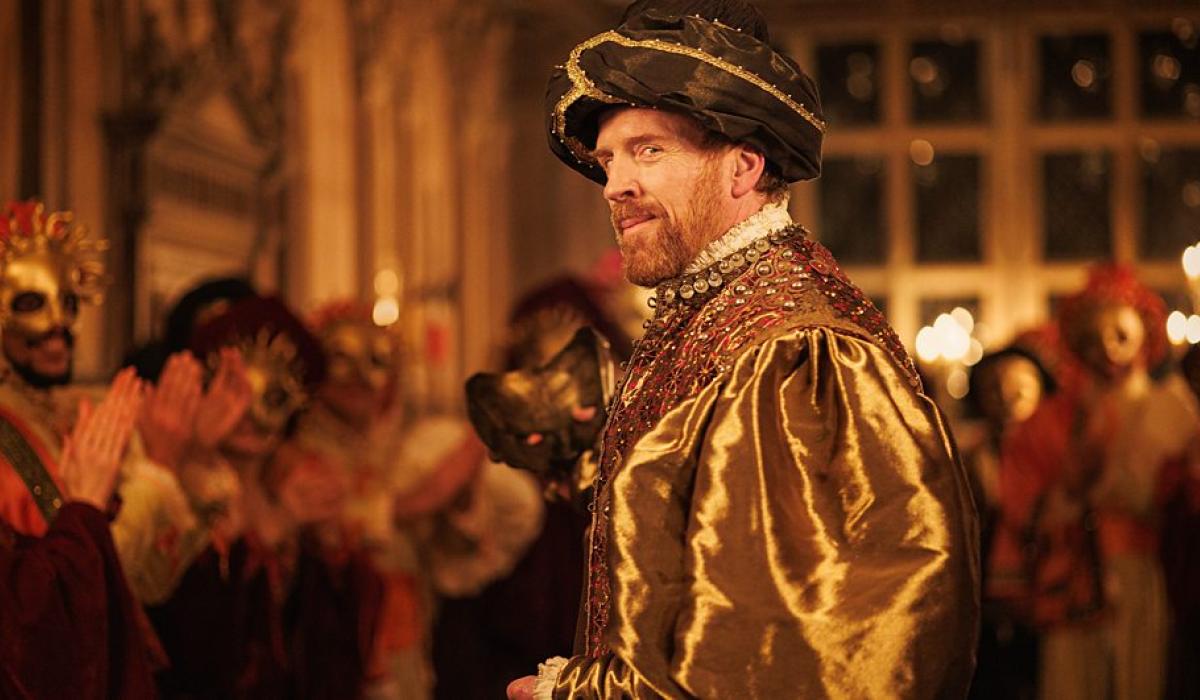 A TV production set shows Henry VIII at a masked ball.