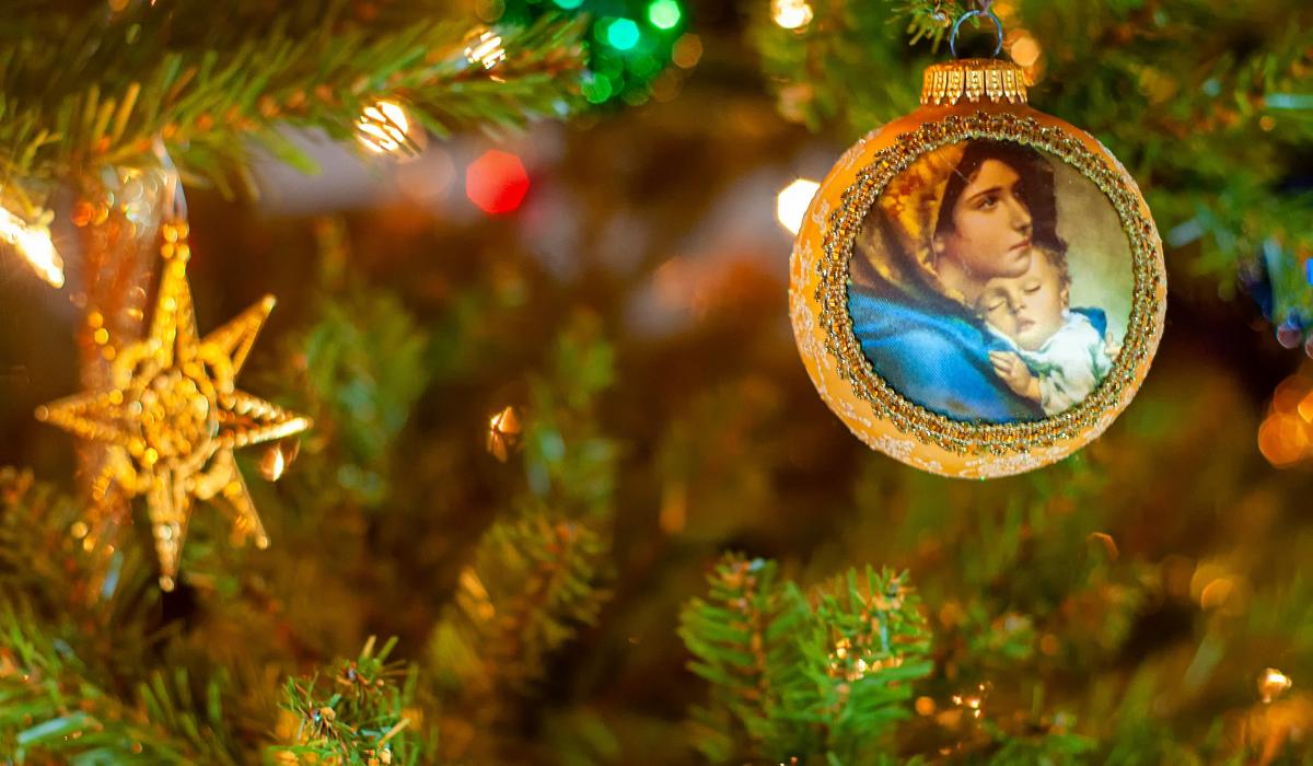 A Christmas tree bauble depicts the Virgin and Child.