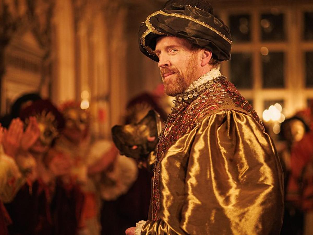 A TV production set shows Henry VIII at a masked ball.