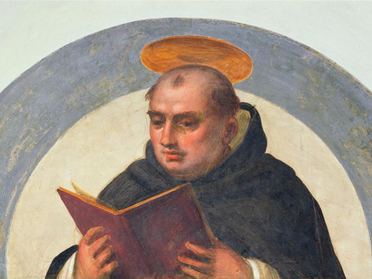 Thomas Aquinas reads.