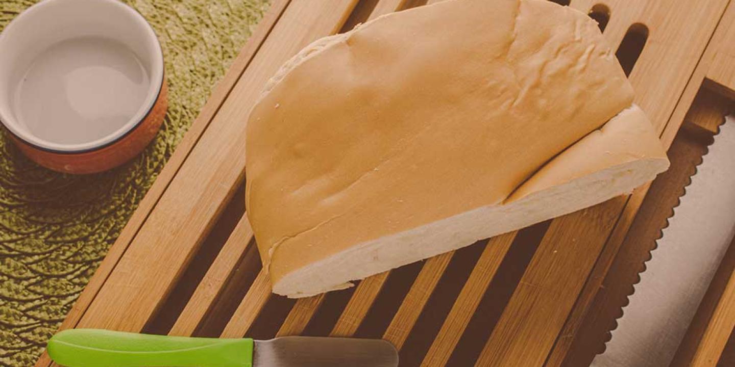 bread a piece of cutlery rest on a breadboard