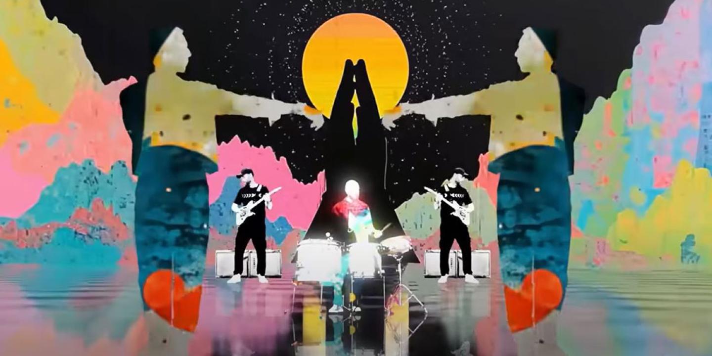 A colourful graphic overlay of praying hands over a band playing.