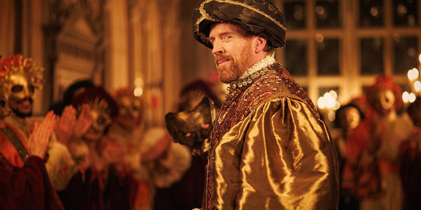 A TV production set shows Henry VIII at a masked ball.