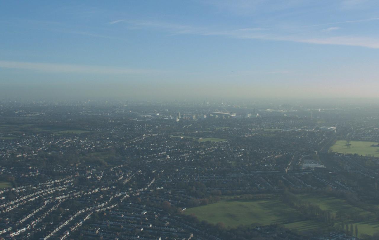 An aerial view across West London towards Grenfell Tower