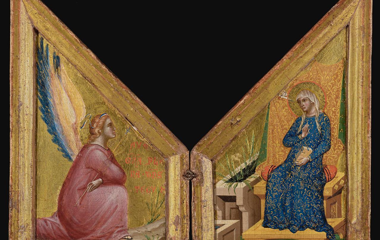 A two sided altarpiece painting shows an angel kneeling on on one side and a Madonna on the right hand side.