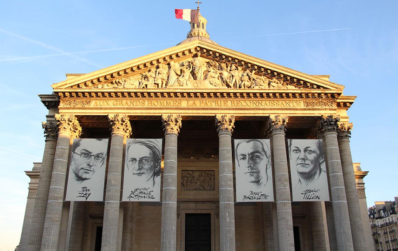 Paris' Pantheon temple displays a flag and banners.