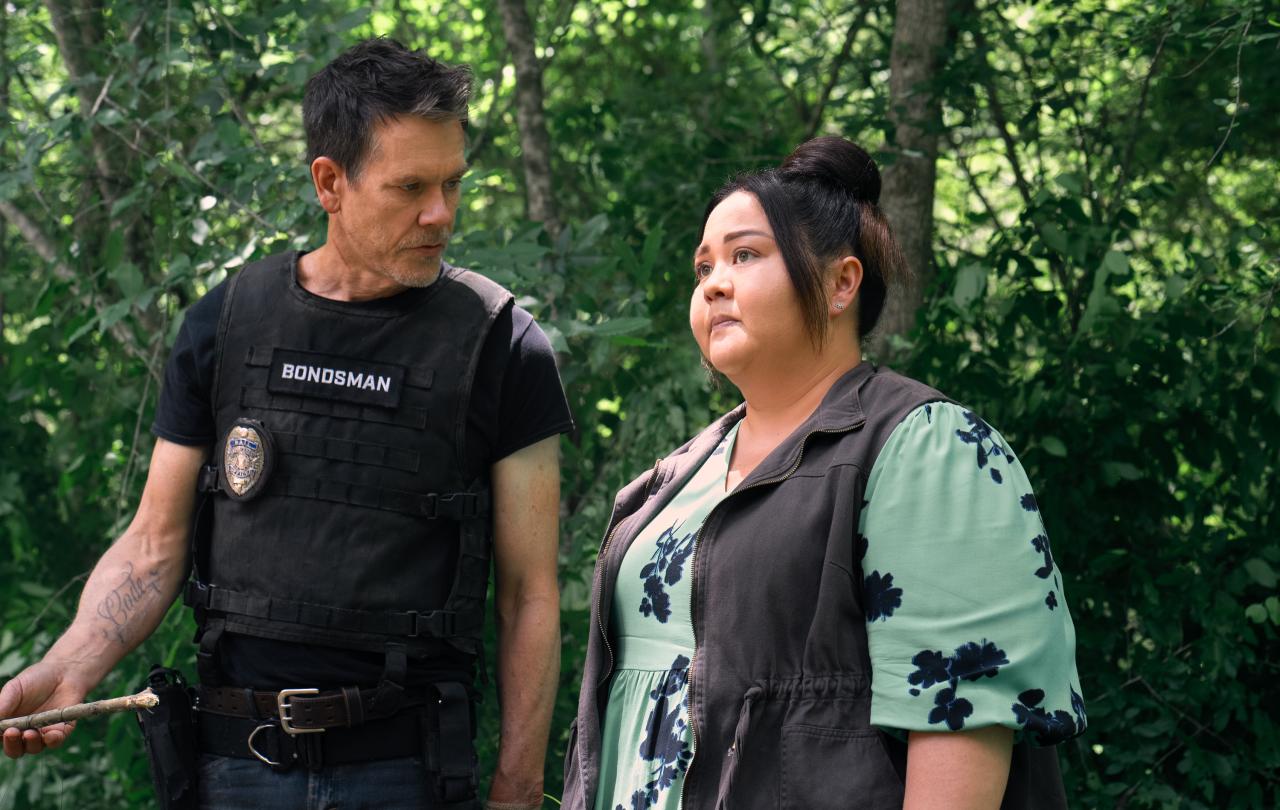 A bondsman looks to a colleague.