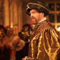 A TV production set shows Henry VIII at a masked ball.